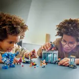 Kids playing with Iron Man set.
