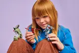 Child playing with Iron Man and the Hammer Drones.