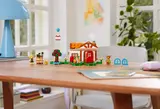 Full LEGO set on a wooden table.