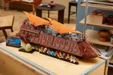 Barge on wooden surface.