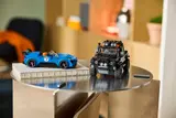 LEGO cars on display table.