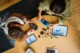 People building LEGO cars.