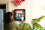 Set being hung on a wall