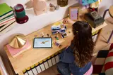 Child building the jewelry box set