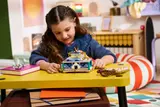 Girl playing with completed jewelry box