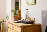 LEGO Jaws set displayed on a wooden dresser.