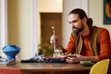 Person holding and admiring the LEGO Jaws set.