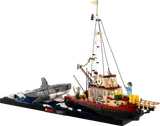 LEGO Jaws set with Orca boat, shark, and three minifigures on display.