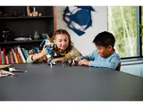 Children playing with Jay's Titan Mech.