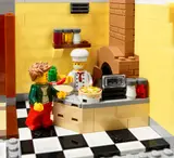 Pizzeria kitchen with chef.