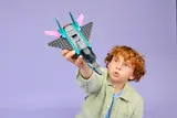 Child holding jet.