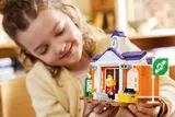 Child Holding Plaza Building