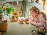 Child playing with Moana LEGO set.