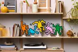 Figures on a display shelf.