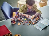 Kid building mansion.