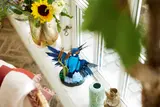 Kingfisher model on windowsill.