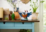 Kingfisher on a wooden desk.