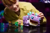 Child playing with Klombo set.