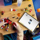 Building the mech with digital instructions.