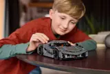 Boy smiling at Technic Jesko Absolut