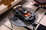 Sadair model on glass table.