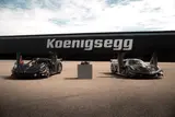 LEGO Sadair between two real cars.