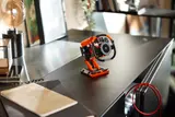 LEGO Technic steering wheel as a desk display.