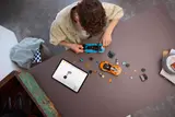 Overhead view of LEGO car building.