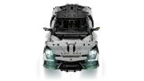 Revuelto, frontal with lights on.