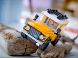 LEGO Defender on driftwood.