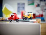 LEGO Defender next to LEGO Vespa.