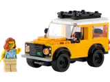 Yellow LEGO Defender and minifigure.