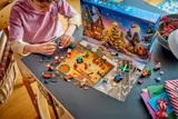 Child playing with Advent Calendar.