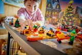 Child playing with Advent Calendar builds close-up.