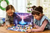 Kids playing with Frozen Advent Calendar.
