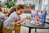 Child playing with LEGO Disney Calendar