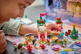 Child interacting with LEGO mini-builds