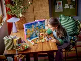 Child playing with LEGO Friends Advent Calendar.