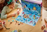 Child playing with Advent Calendar.