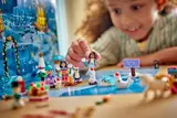Child playing with Friends minifigures.