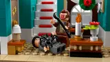 Marv with spider, Harry on stairs.