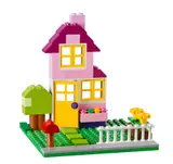 Pink LEGO house with garden.