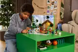 Child playing with Minecraft Advent Calendar.