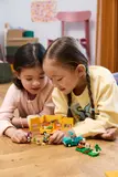Friends sharing caravan play.