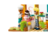 Close-up of Leo baking a cake with Olly.
