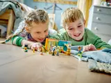 Children playing with LEGO Friends Leo's Room.