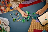 Child building dragon mech with tablet