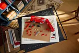 Deconstructed LEGO bus on a map.