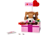 Brick-built puppy in a pink gift box with an 'I ❤️ YOU' sign.