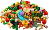 Pile of festive LEGO Lunar New Year elements including gold, red, green, and white pieces.